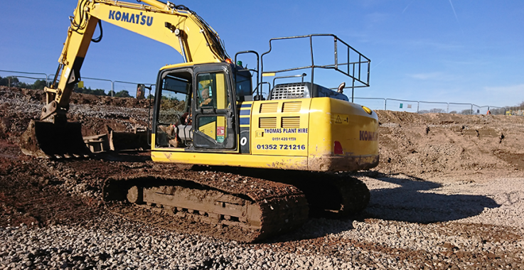 Materials Management header image showing an excavator moving material